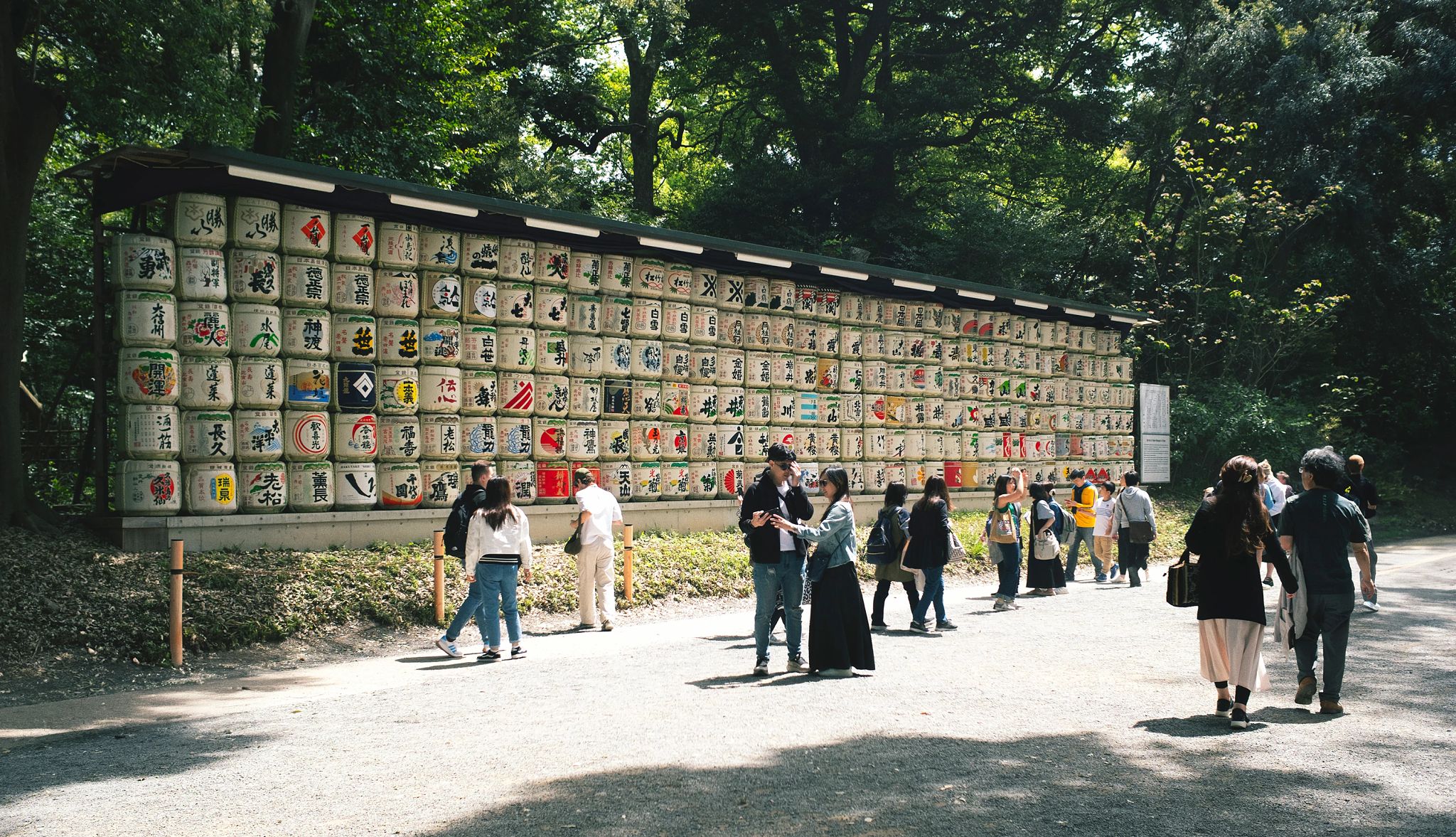Tokyo is wheelchair accessible people observe a Shinto shrine, in Shibuya