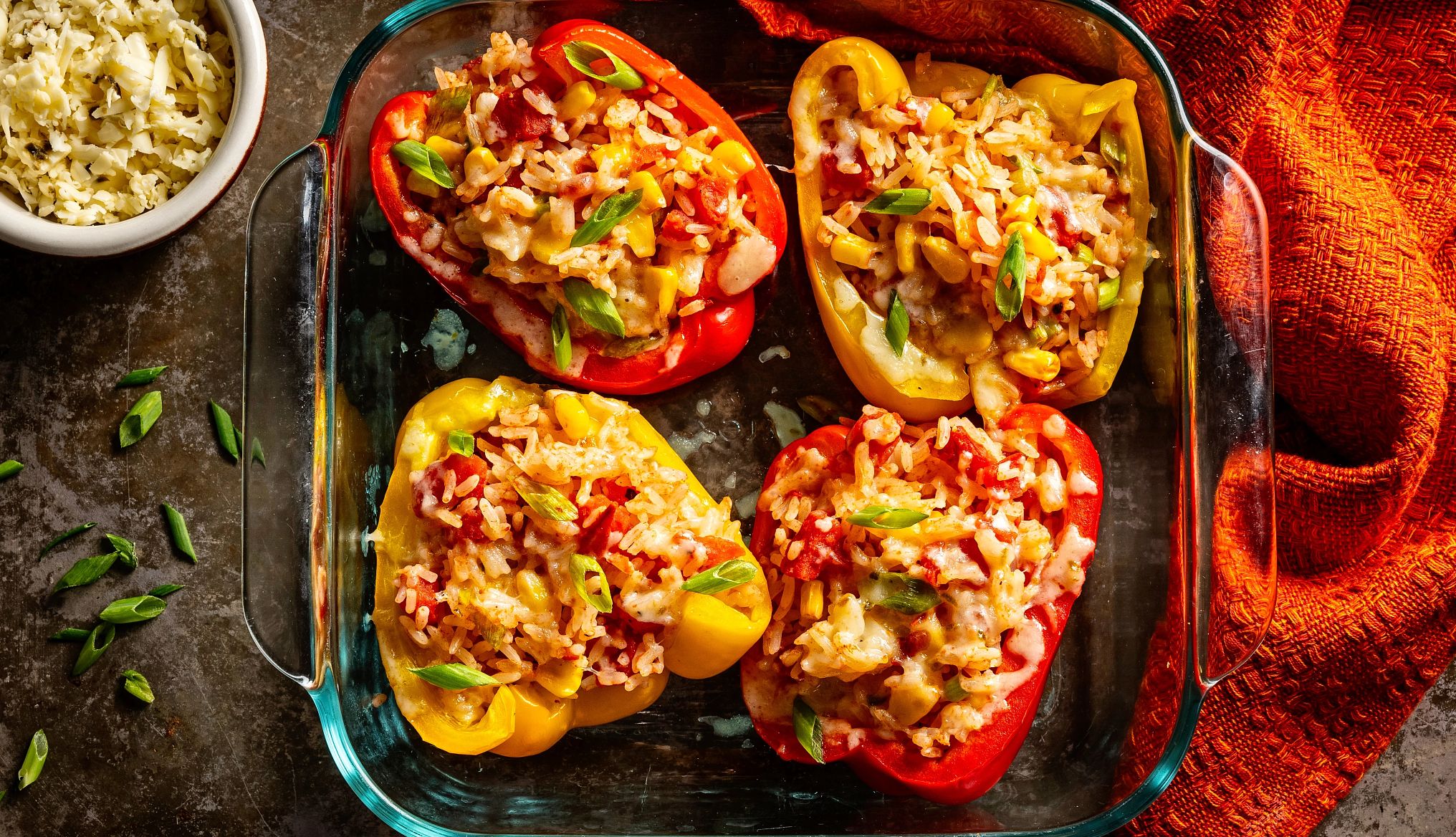 stuffed peppers in a baking dish