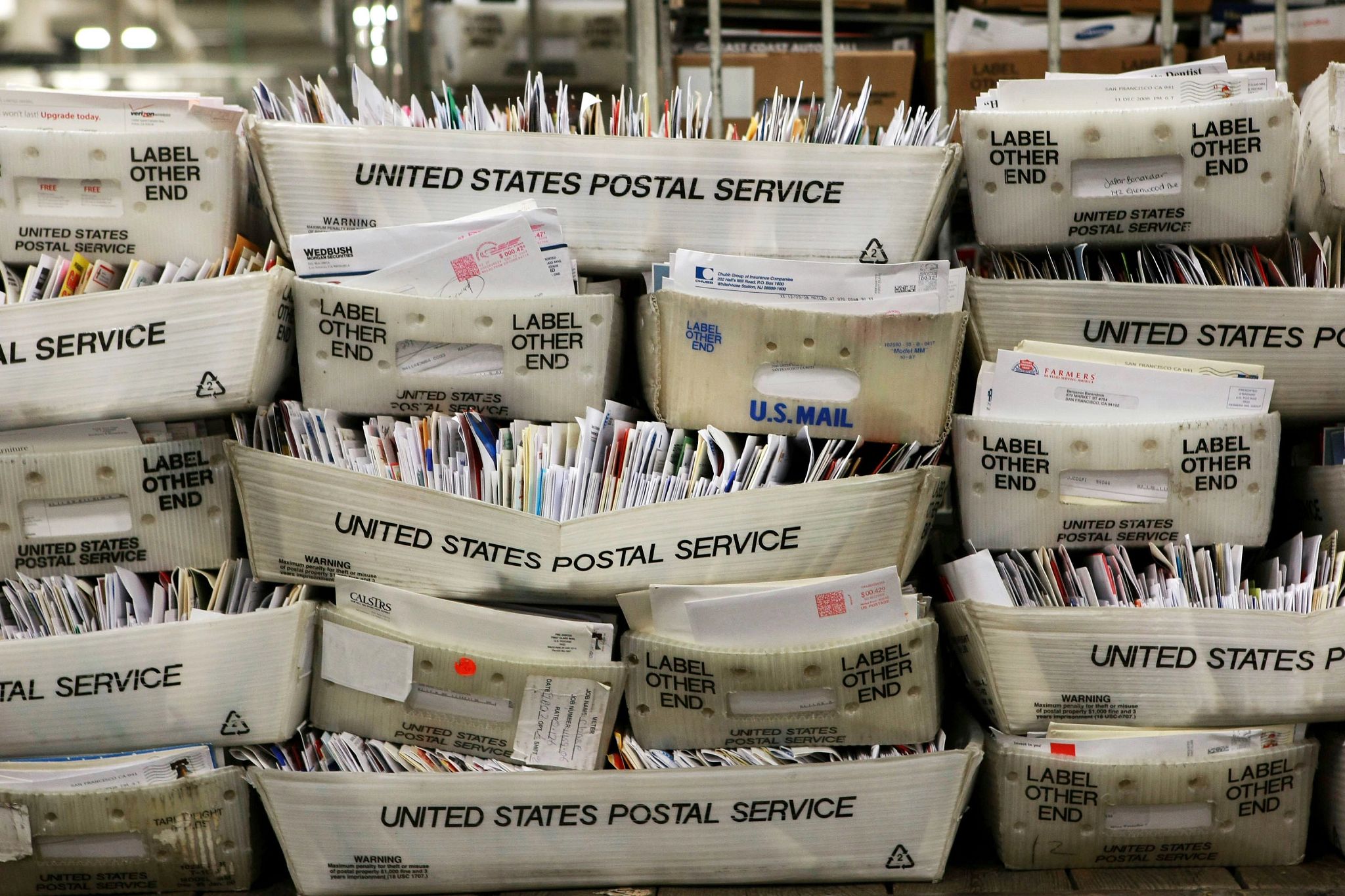 Stacks of boxes holding cards and letters are seen at the U.S. Post Office