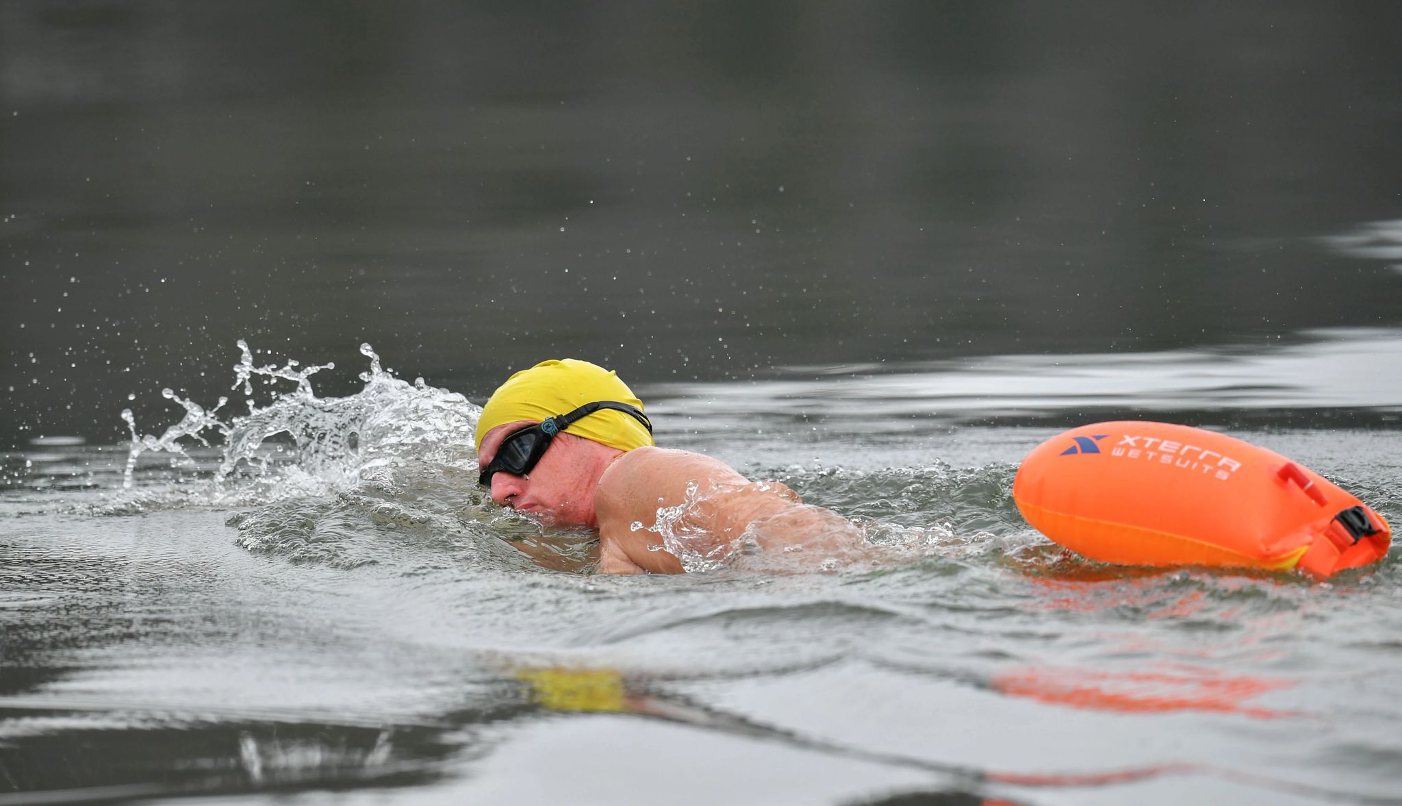 Oldest Man to Swim the Ice Mile Don Winters swimming in water