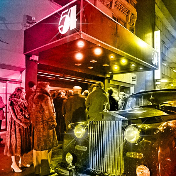 the exterior of studio 54, with a line of people waiting to get in