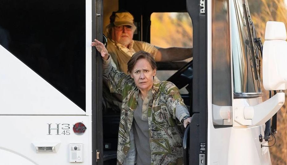 Laurie Metcalf getting off a tour bus in the Max series Hacks