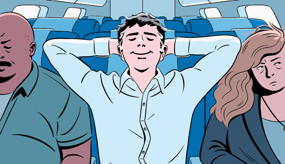a person in a middle seat of an airplane with their arms behind their head