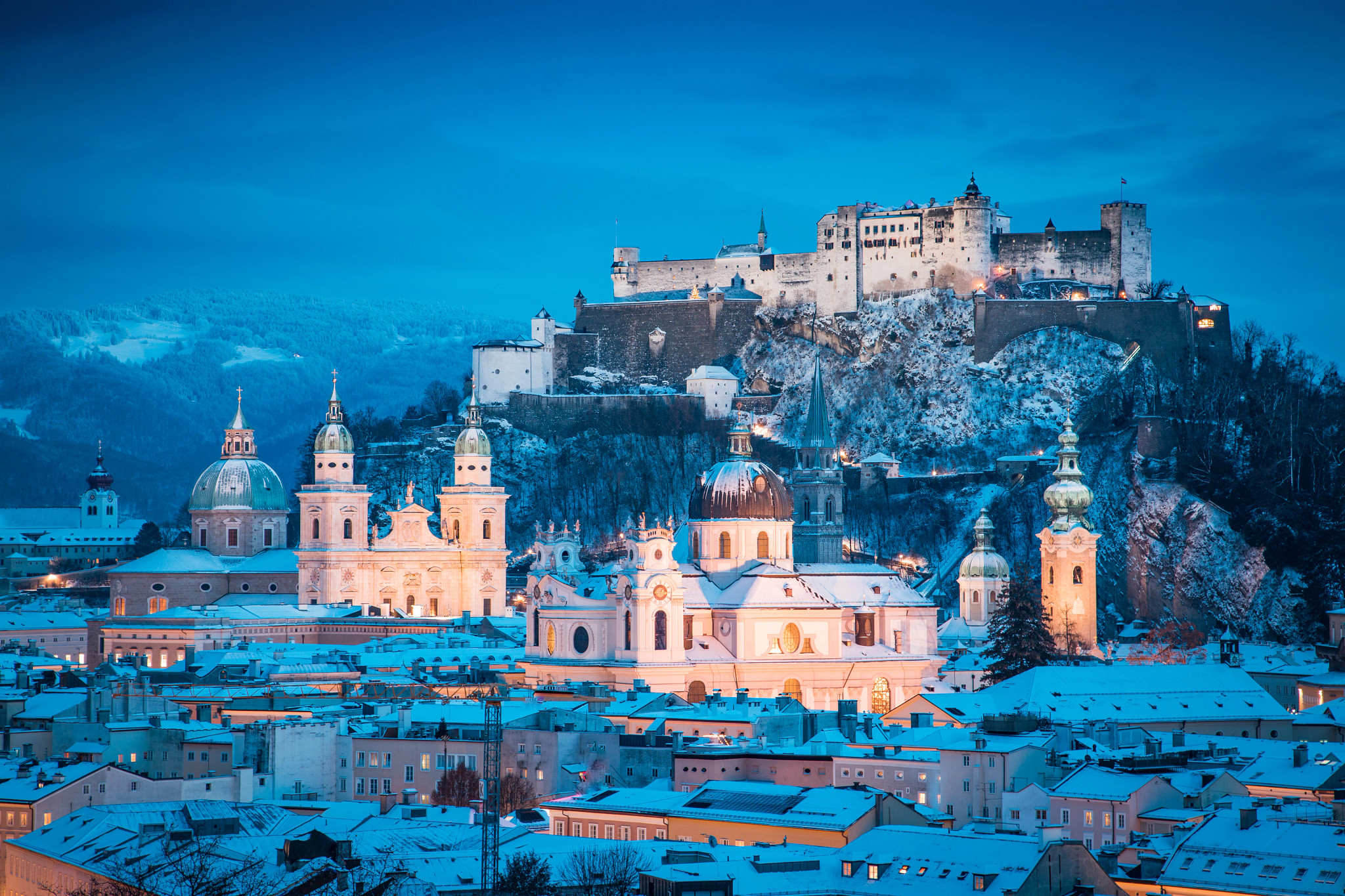 snow covers the historic city of salzburg, austria, at christmas time