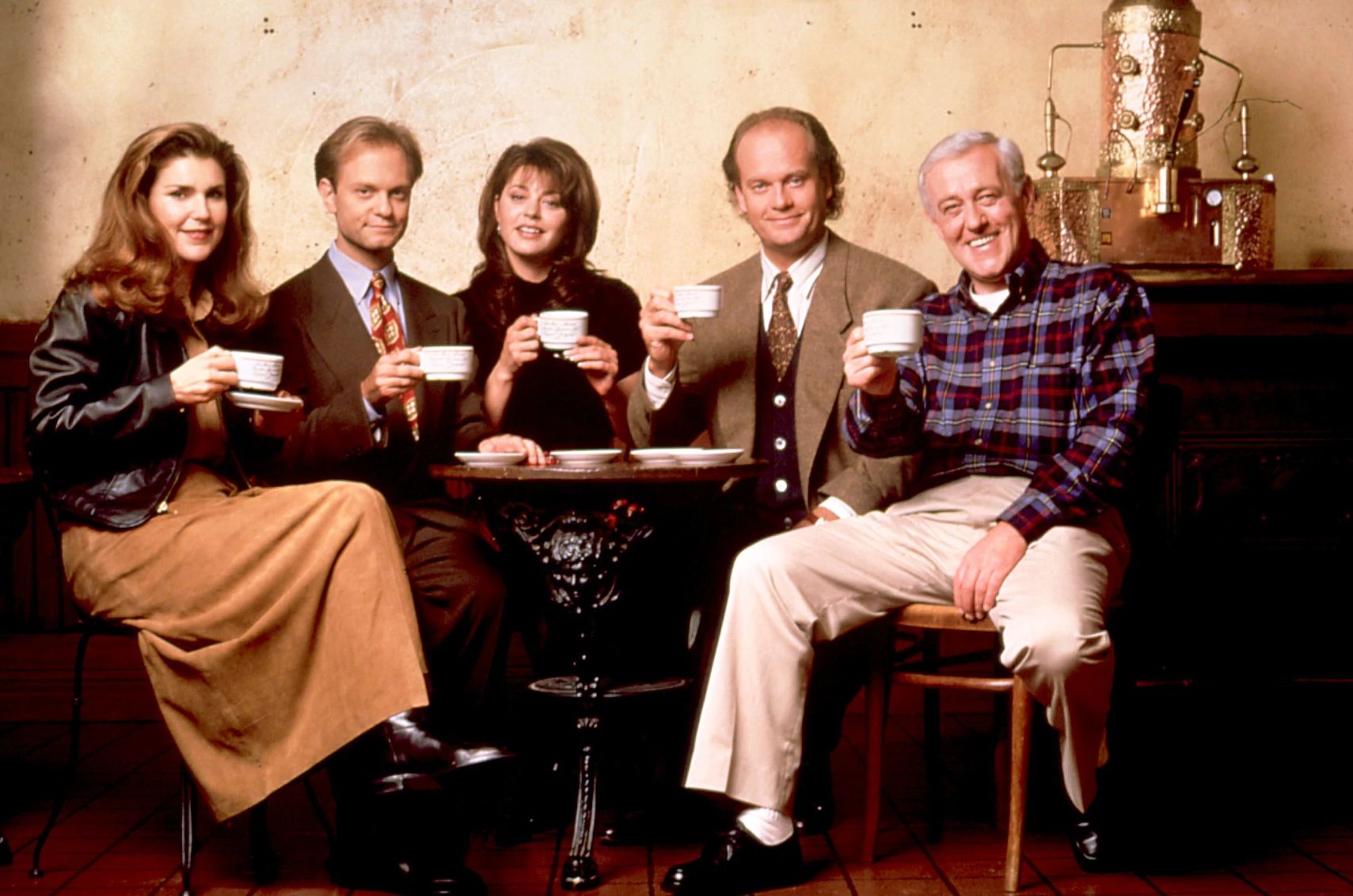Kelsey Grammer Welcomes New Son the cast of frasier sitting at a table