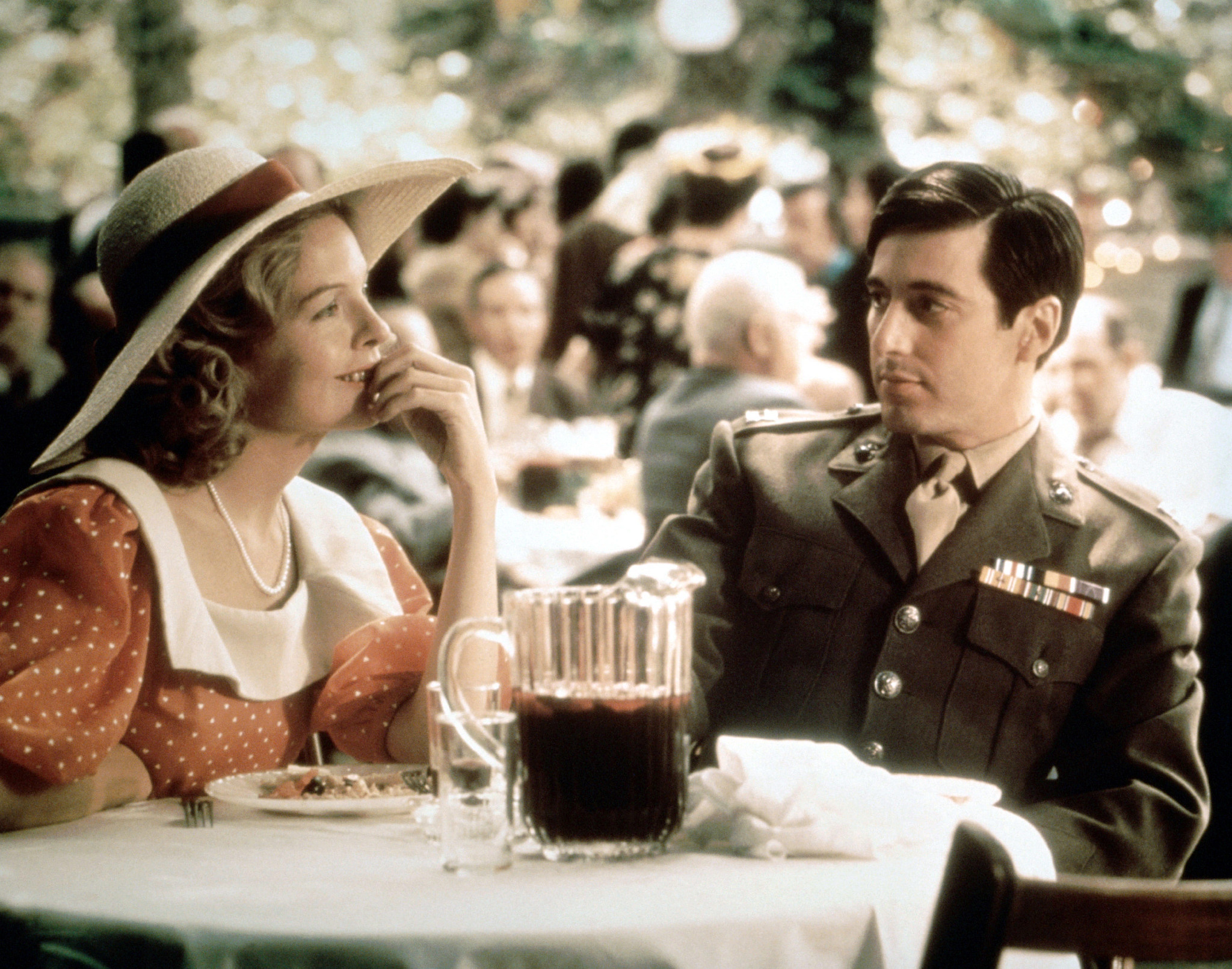 a still of diane keaton and al pacino in the godfather movie