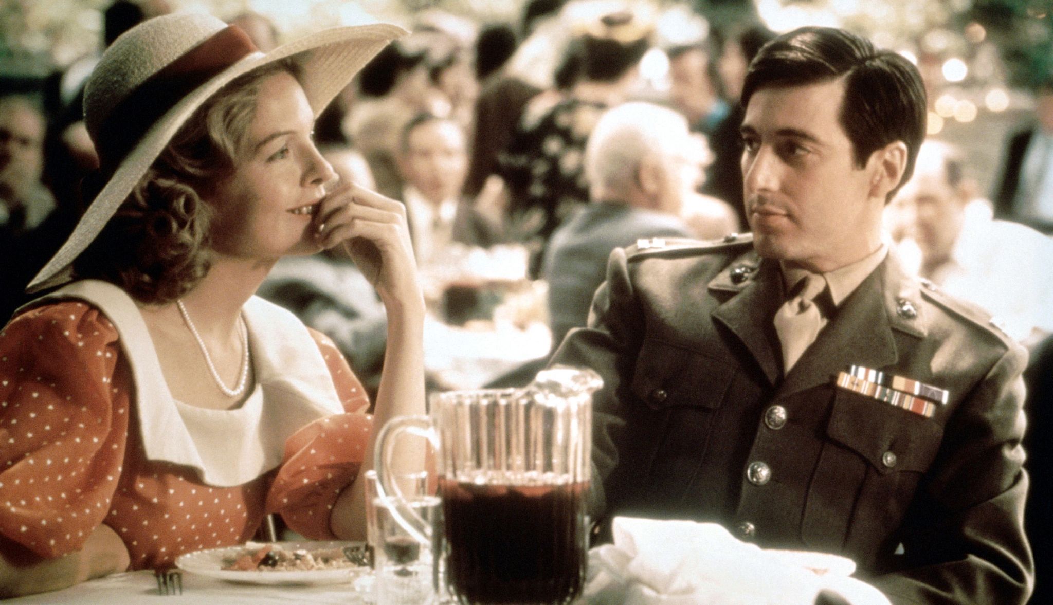 Diane Keaton Obit a still of diane keaton and al pacino in the godfather movie