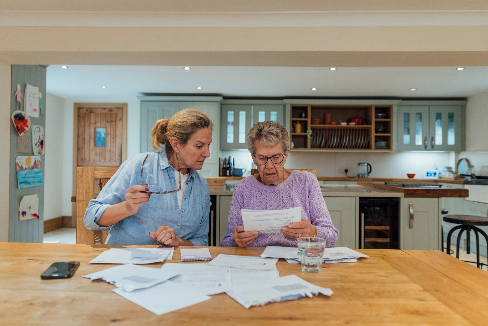A senior woman and her mature daughter 