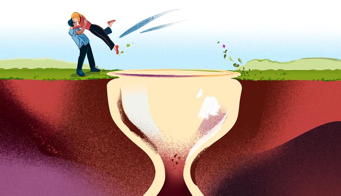 Marrying a man 15 years younger Illustration of man picking woman up off ground over an hourglass shaped gap in the ground