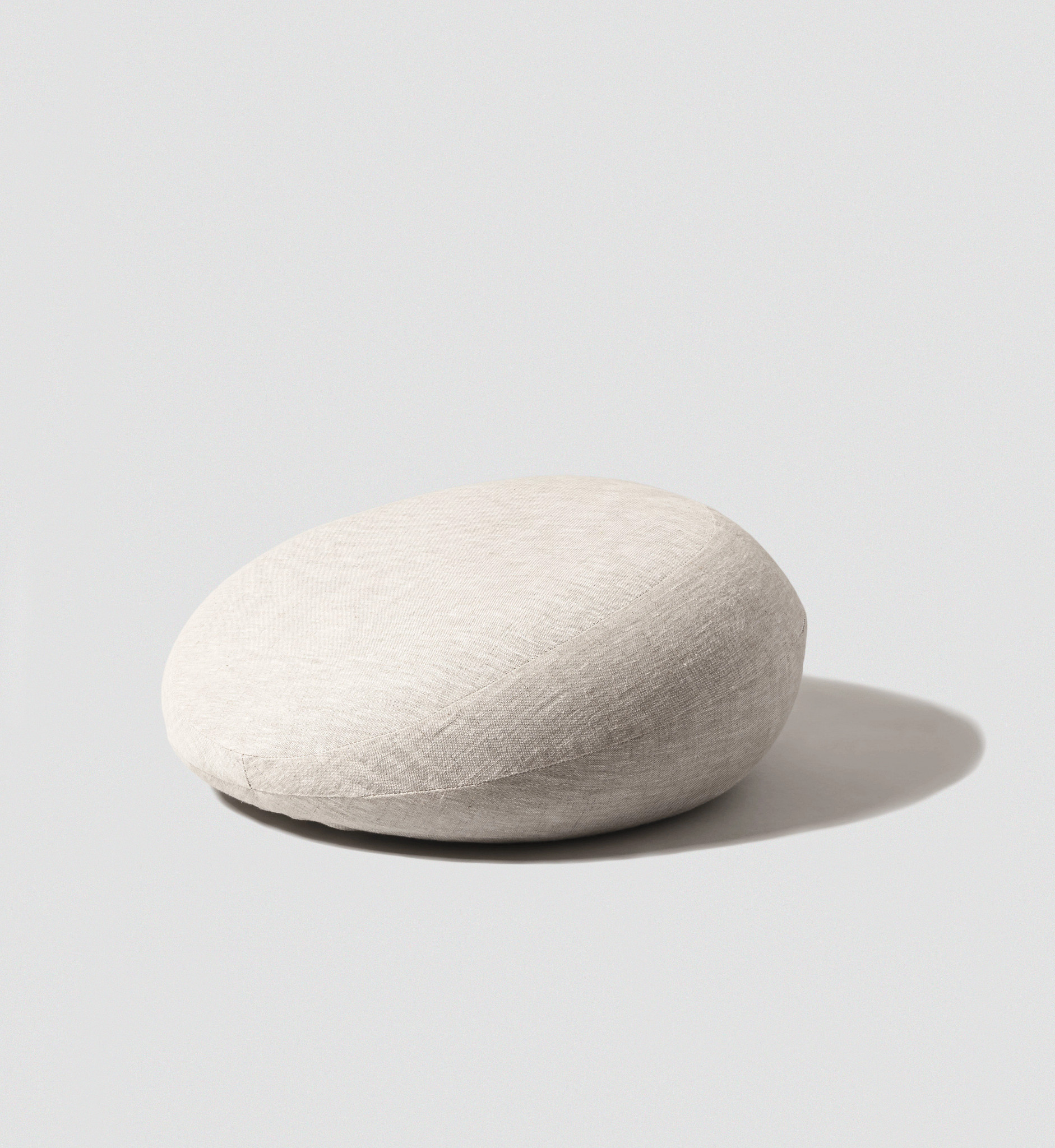The Prim intimacy pillow shown in a studio setting with soft neutral tones.
