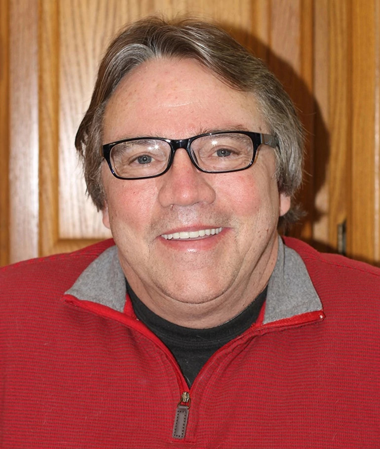 Ken Koheler in a Red Half-Zip