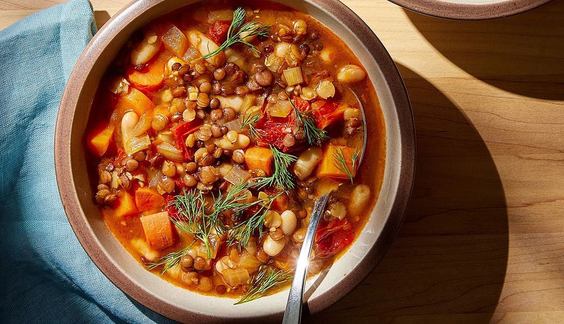 https://aarp.widen.net/content/pu6xodikwq/jpeg/1140-vegan-lentil-soup.jpg?crop=true&anchor=0,0&q=80&color=ffffffff&u=xp0vsk&w=1140&h=655 https://aarp.widen.net/content/pu6xodikwq/jpeg/1140-vegan-lentil-soup.jpg?crop=true&anchor=0,0&q=80&color=ffffffff&u=xp0vsk&w=1140&h=655