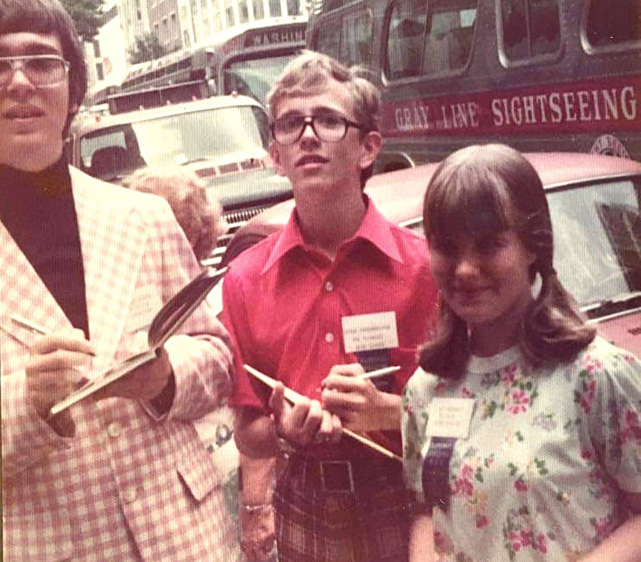 Spelling Bee Contestants A photo from 1975 shows (from left to right) Scripps-Howard National Spelling Bee contestants Richard Spontak, Brian Throckmorton and Amy Blakely on a busy city sidewalk.