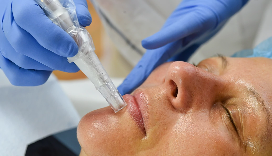 Wrinkle Management Tips a person receiving a skin treatment in a clinical setting