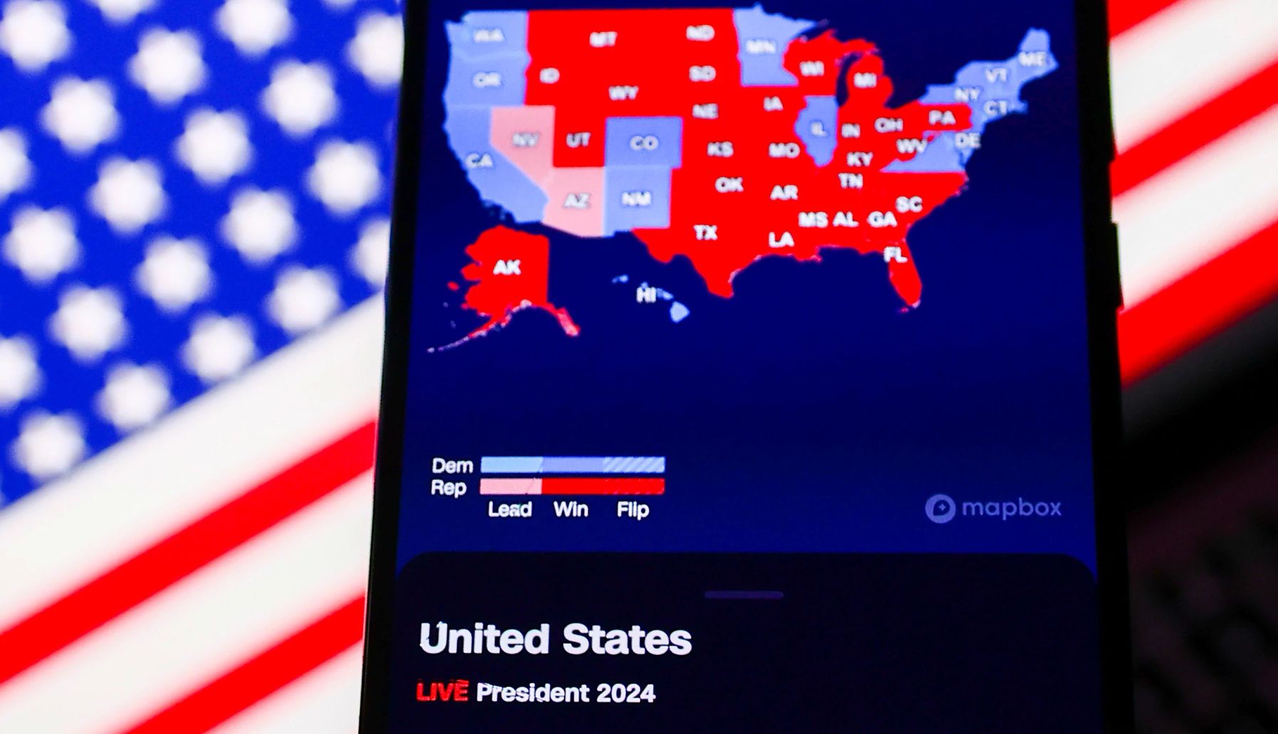 Older voters and Trump the c n n magic wall map with presidential results is screened on a mobile phone