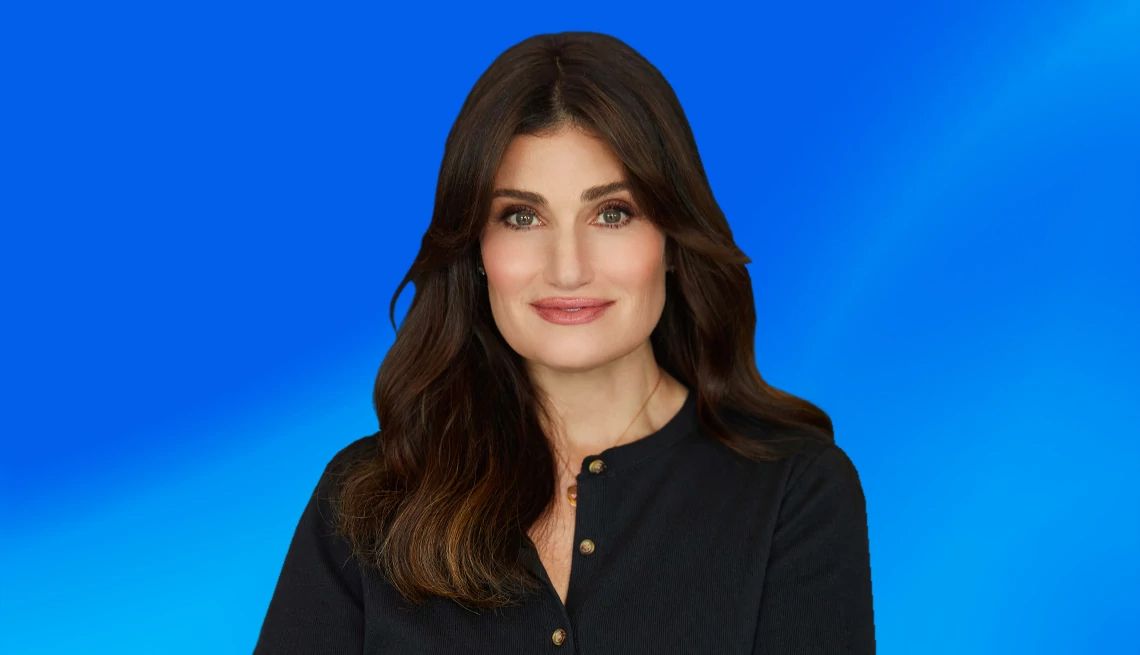 Idina Menzel interview Idina Menzel against blue ombre background