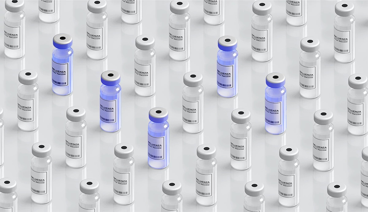 Multiple influenza vaccine vials arranged in a repeating pattern.