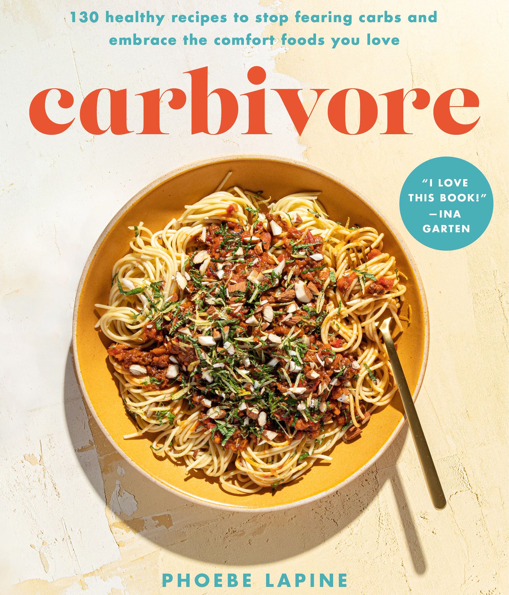 Cookbook 'Carbivore: 130 Healthy Recipes to Stop Fearing Carbs and Embrace the Comfort Foods You Love' by Phoebe Lapine Cookbook that says 130 Healthy Recipes to Stop Fearing Carbs and Embrace the Comfort Foods You Love, Carbivore, Phoebe Lapine; bowl of spaghetti with sauce on cover