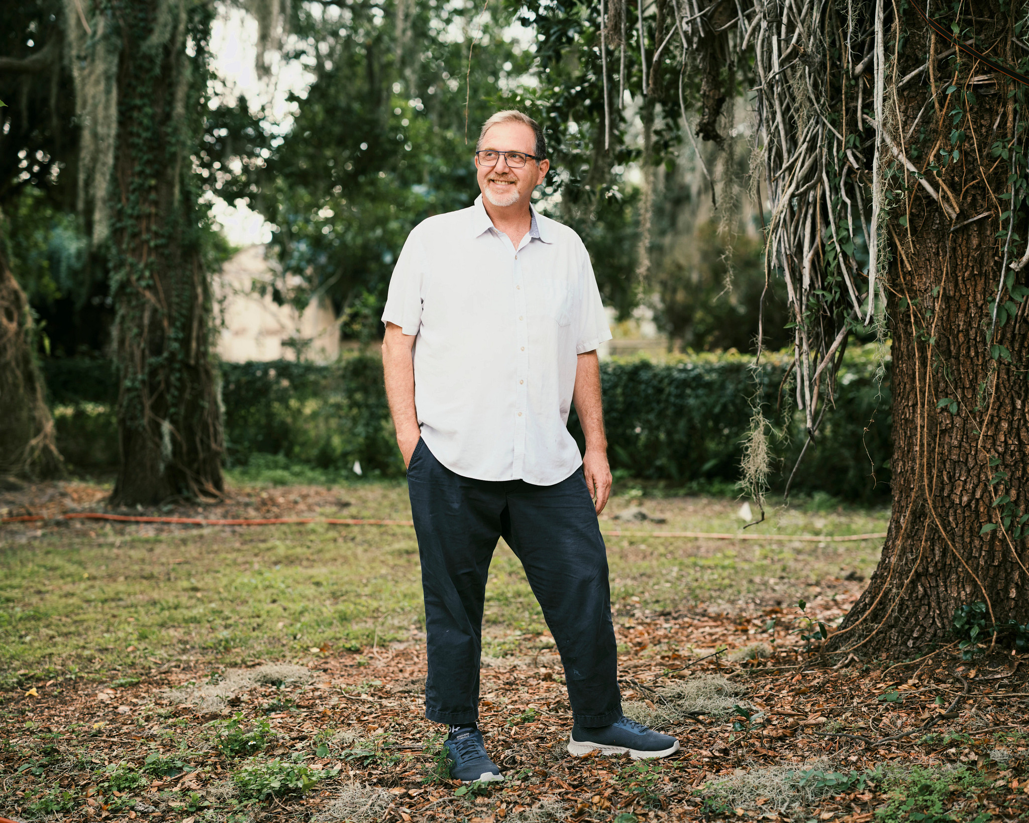 a person posing for a picture outdoors