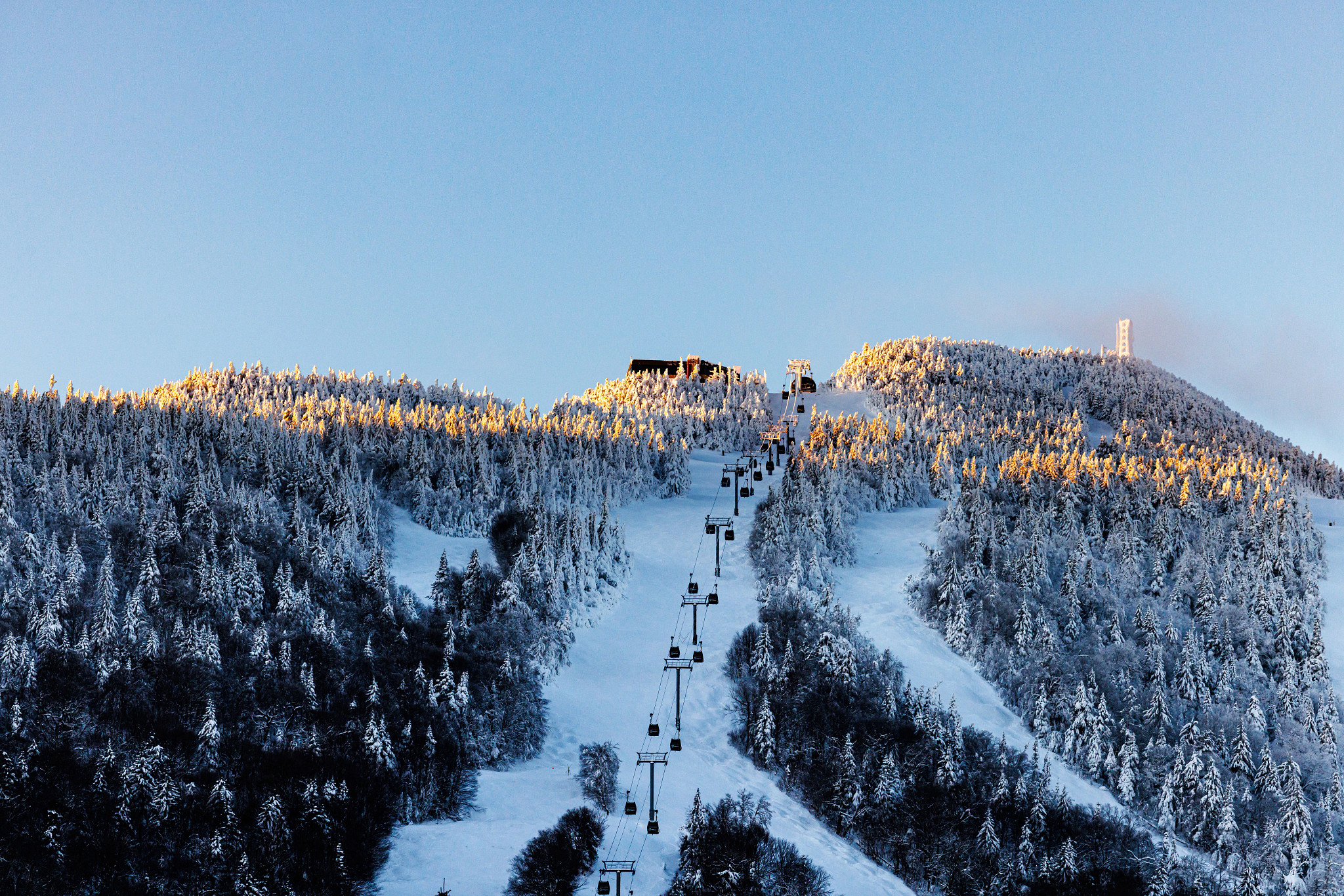 a gondola on a snowy mountainside