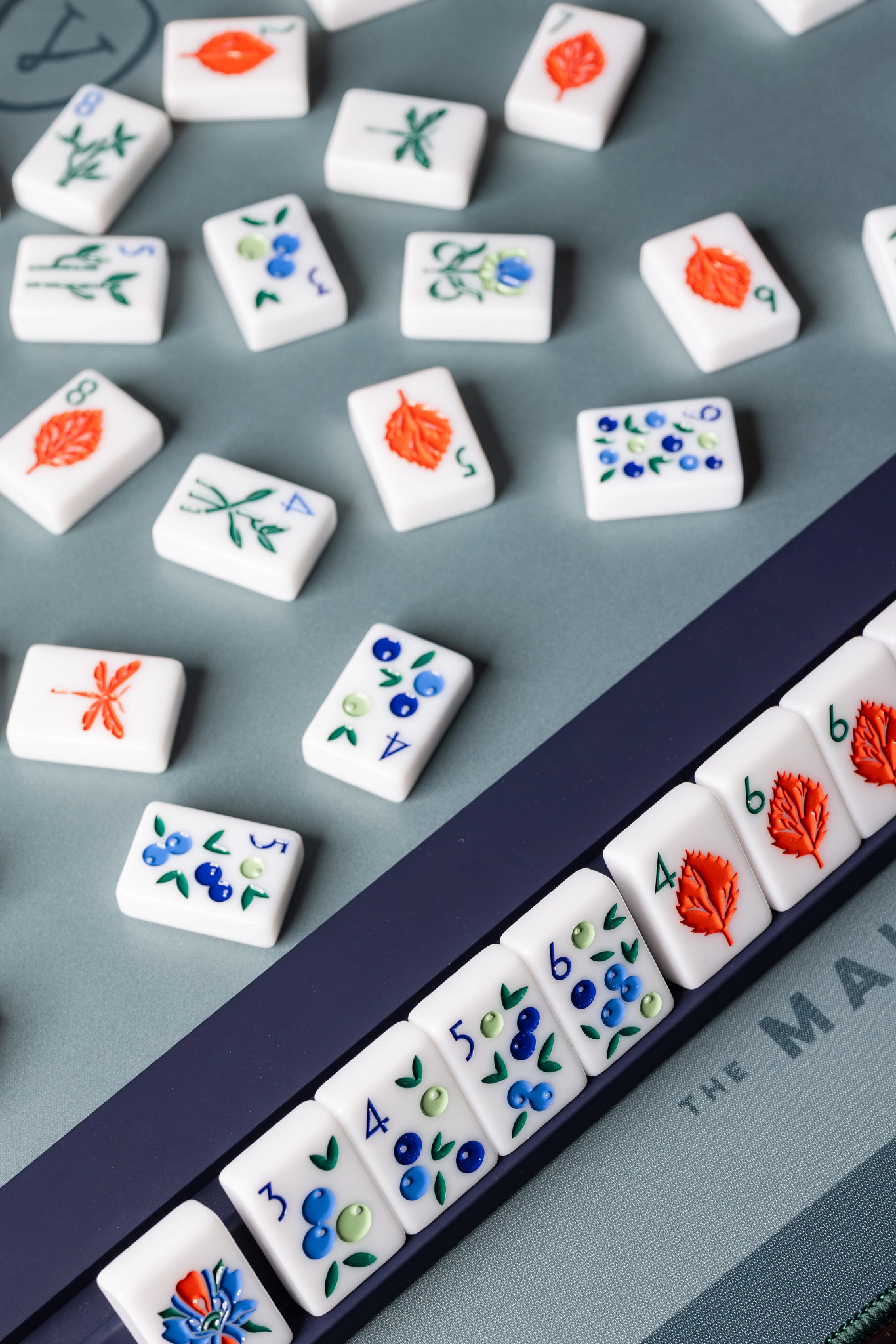a close up of mah-jongg tiles on a board