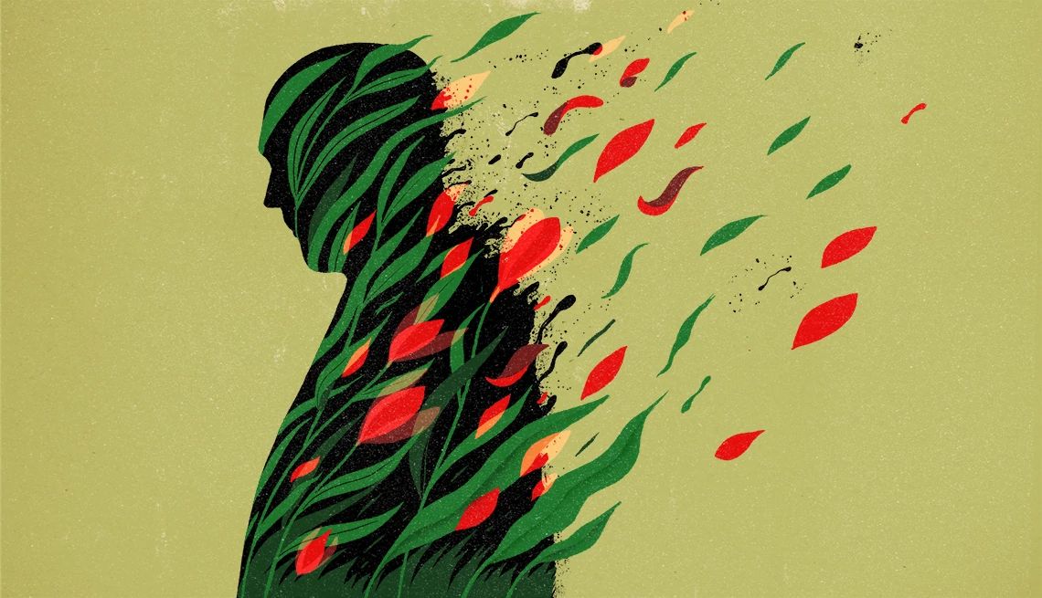 grieving the loss of a father Digital art silhouette of a human figure with a vibrant dispersion of red and green leaves