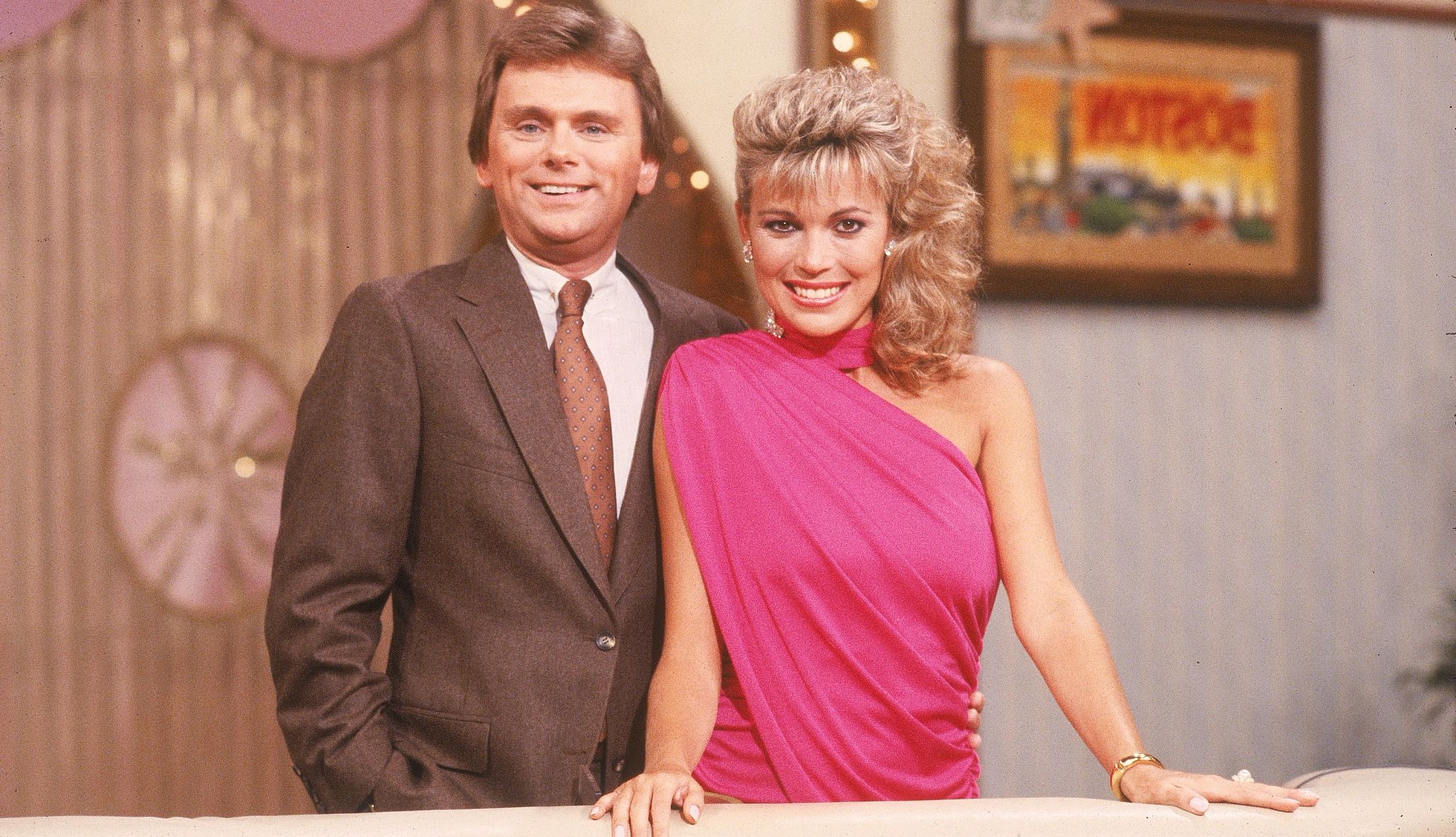 Vanna White Plays to Win pat sajak and vanna white smiling for a portrait