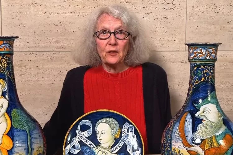 A photo National Gallery of Art curator Alison Luchs in front of some artifacts