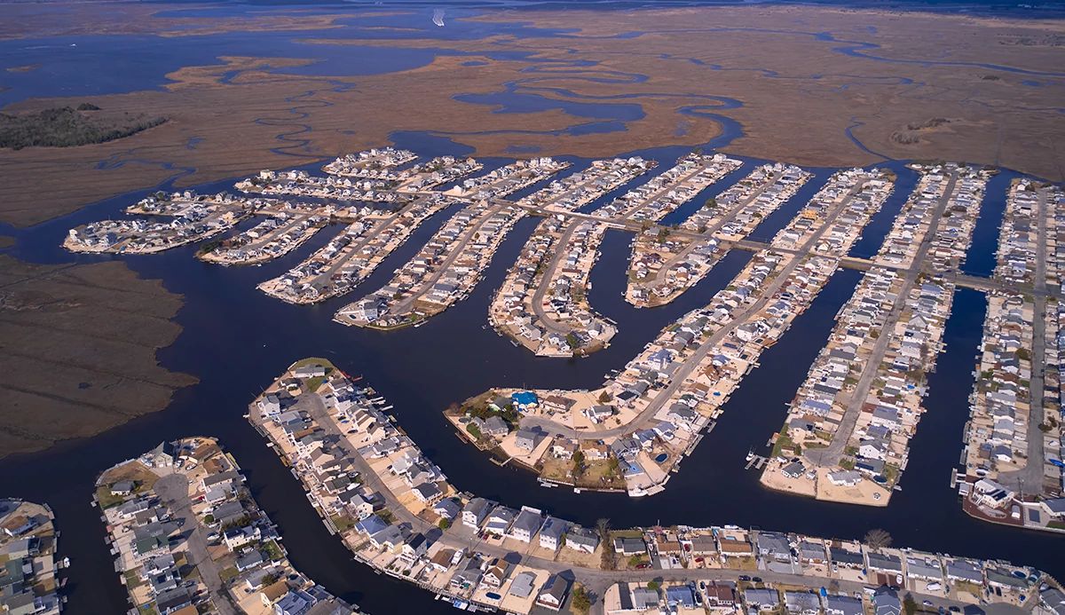 Overhead view of a neighborhood cut through by canals