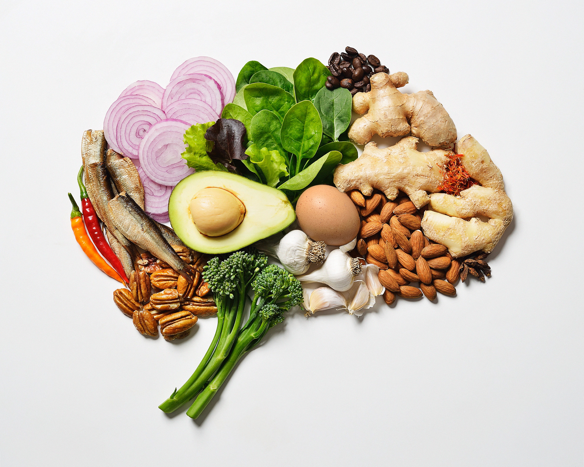 Healthy food for the brain arranged together to resemble a brain