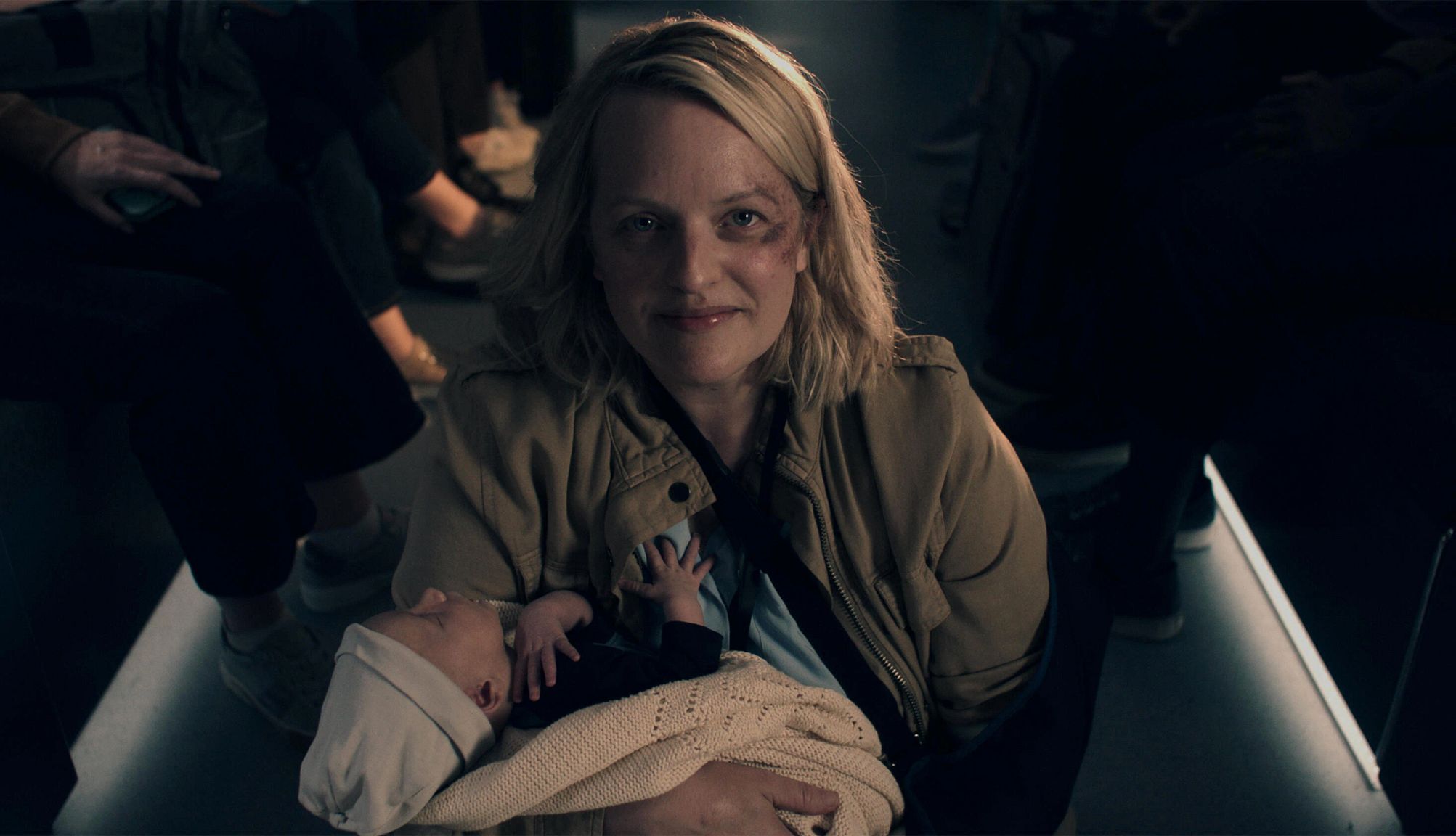 What To Know About ‘The Handmaid’s Tale’ Finale june osborne (elisabeth moss) holding an infant in the handmaid's tale season six