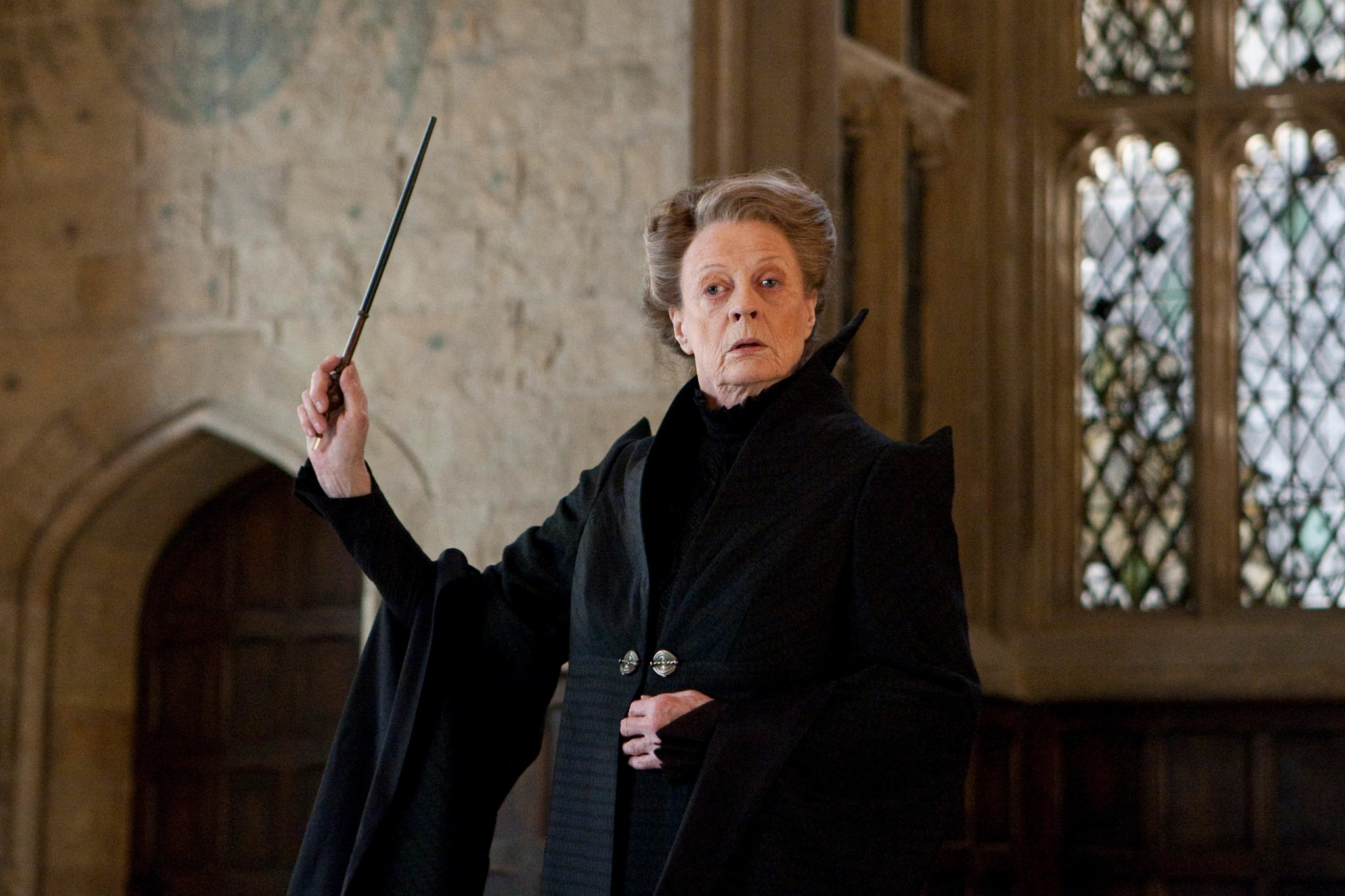 Maggie Smith holding a wand in the film Harry Potter and the Deathly Hallows: Part 2