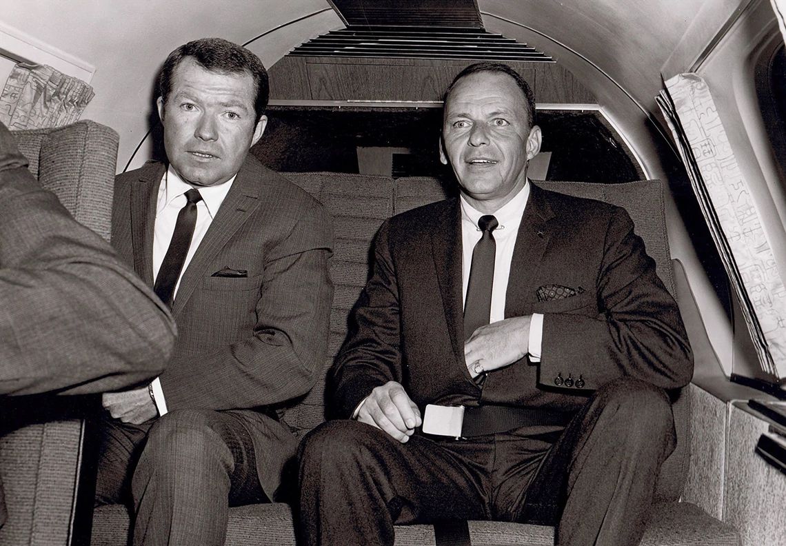 Jim Mahoney and Frank Sinatra jim mahoney in a plane with frank sinatra