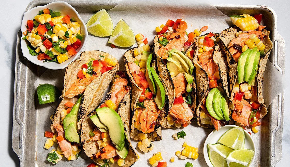 https://aarp.widen.net/content/qqd6lsjco7/jpeg/1140-roasted-salmon-tacos.jpg?crop=true&anchor=0,0&q=80&color=ffffffff&u=xp0vsk&w=1140&h=655
