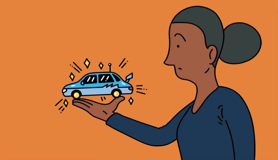 Ways to Save on Car Costs a person holding a car in their hand