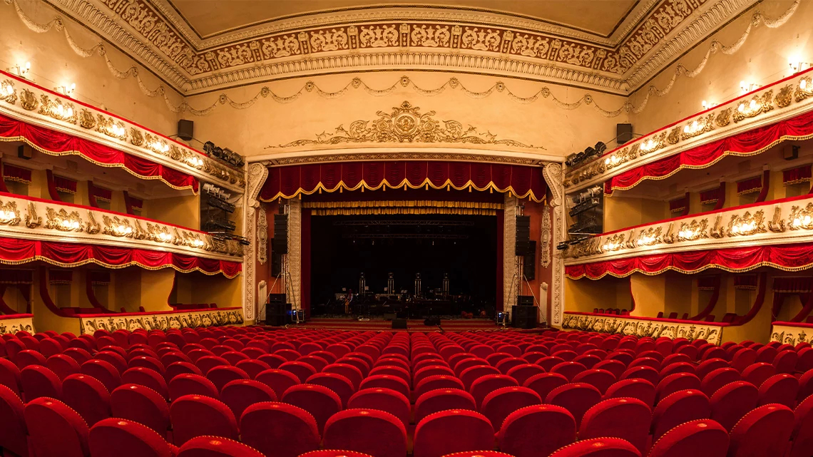 AARP Theatre Red Chairs Hall