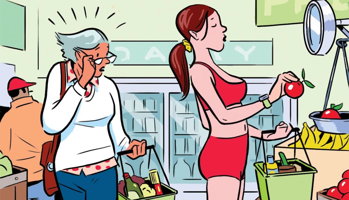 Is she really wearing that in public Young woman in red short shorts and sports bra holding tomato and basket of items in grocery store; older woman holding basket of items, staring at her in disbelief