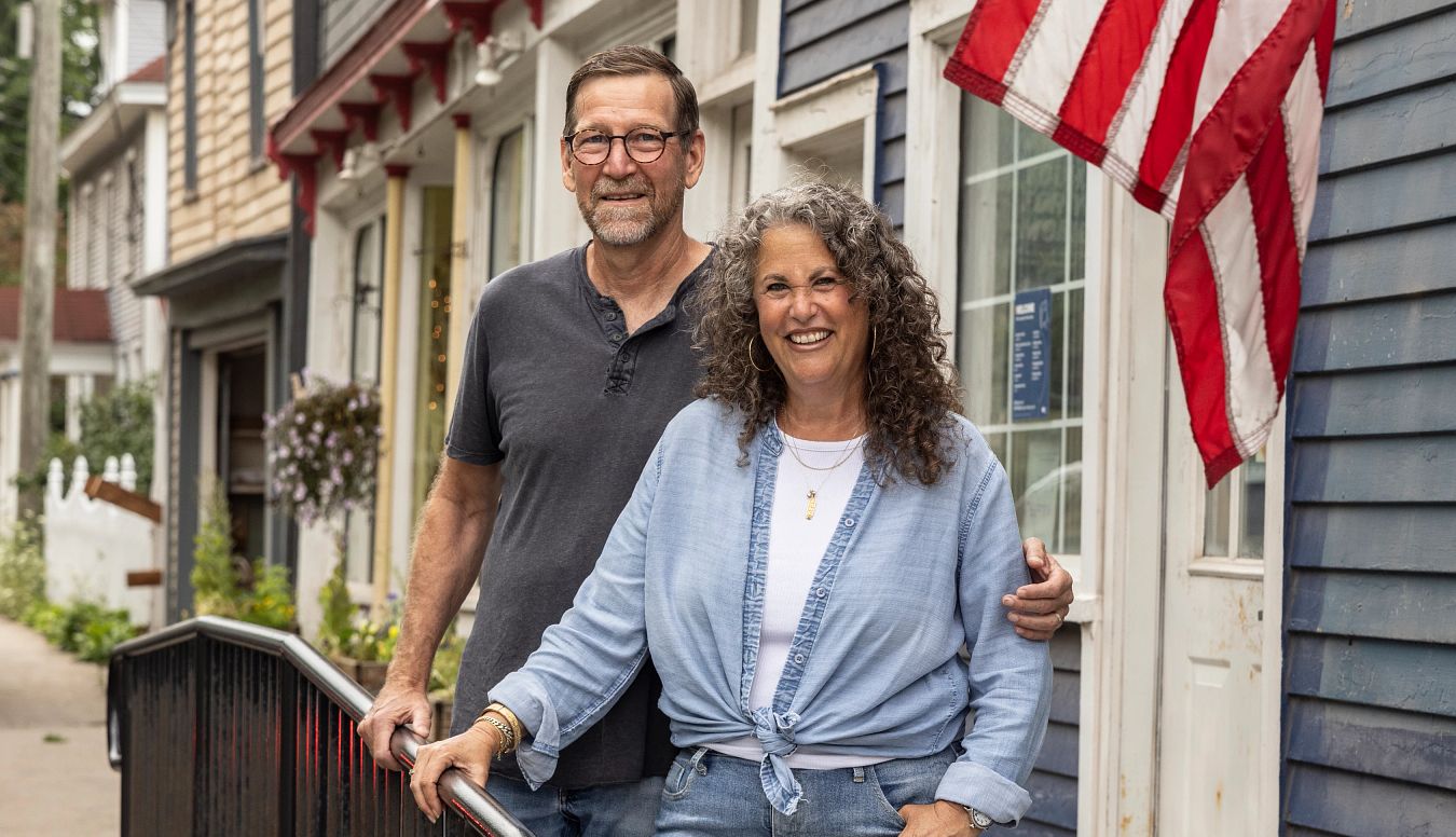 Steve and Jane Rogers standing outside building