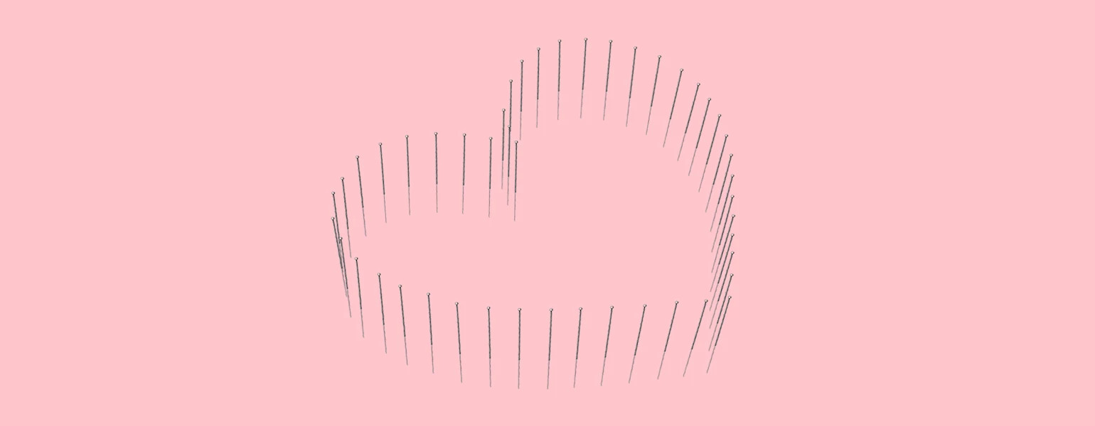 illustration of heart symbol with  acupunture needles