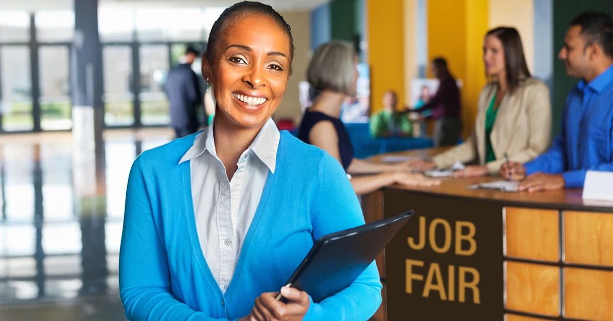 Woman smiling at job fair