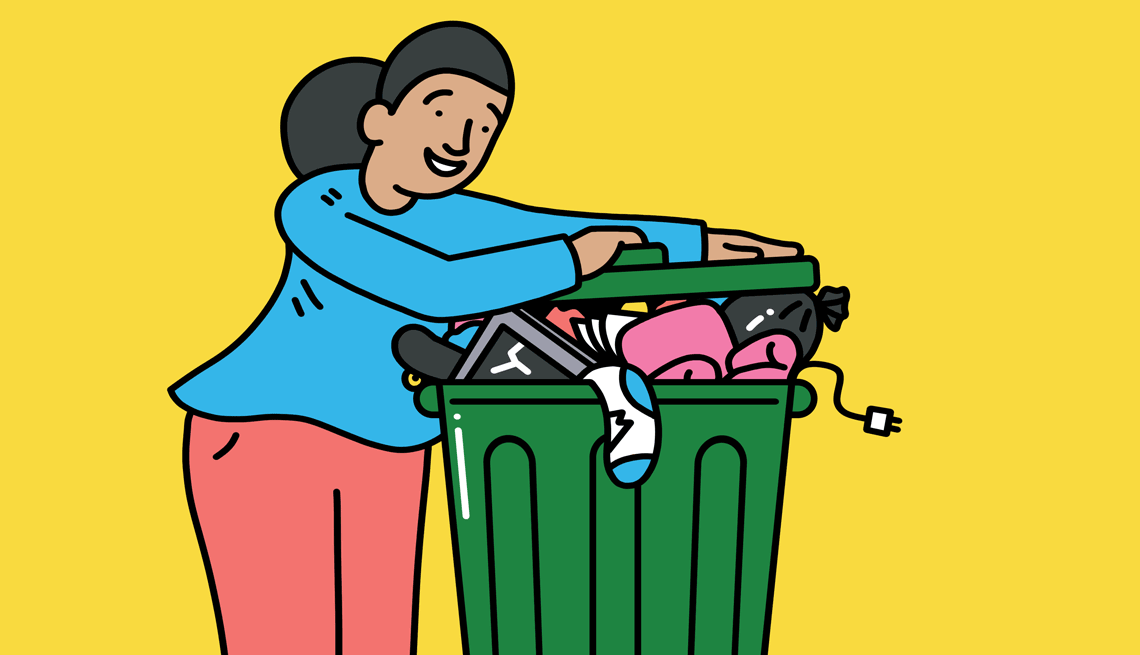 25 Things to Throw Away Right Now a person throwing items away in the trash