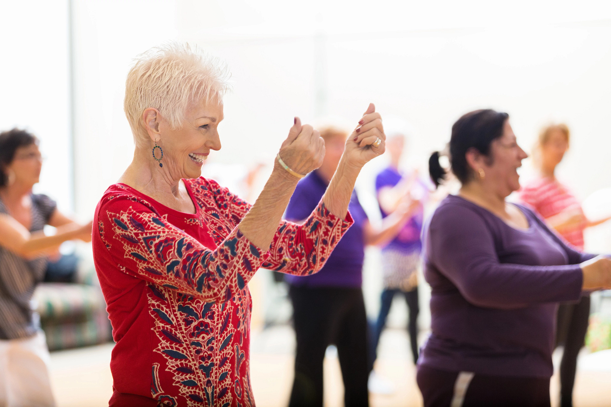 Group of people dancing in a dance class