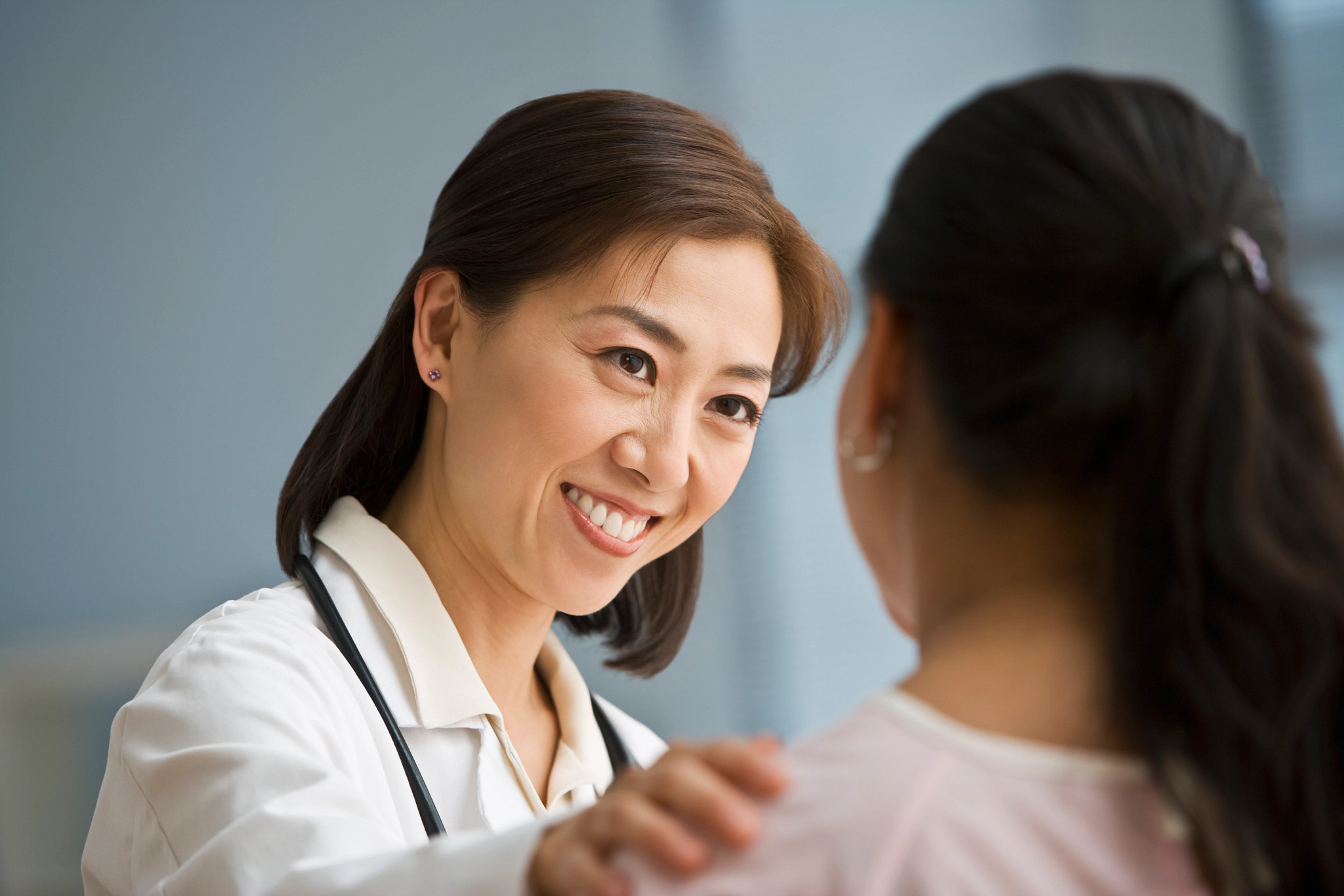 doctor reassuring patient