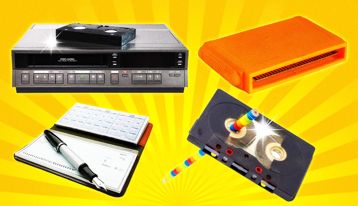 v h s tapes rewinding nintendo cartridge and a check