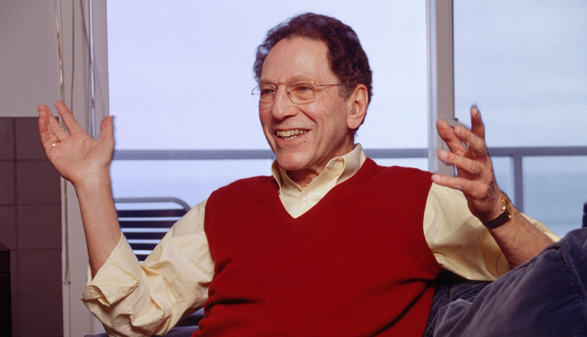 Musical Satirist Tom Lehrer Dies at 97 Tom Lehrer seated at a piano