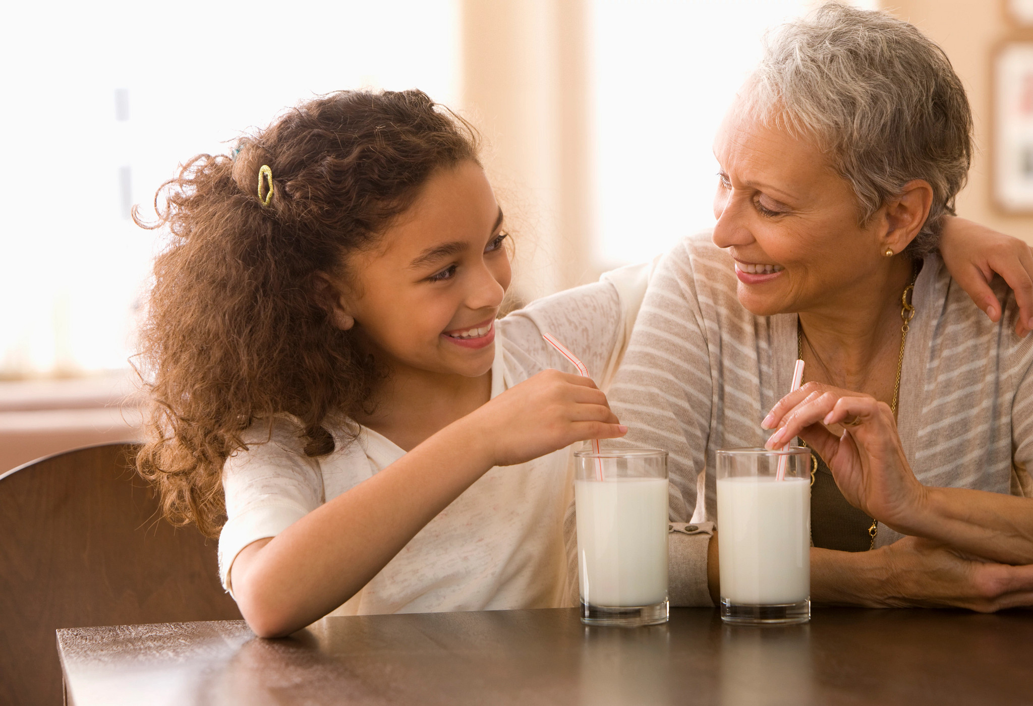 Woman and daughter drinking horchata