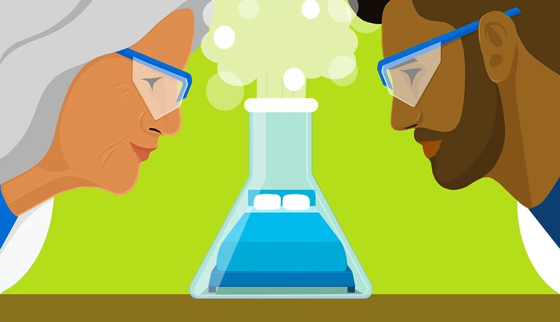 Does an Age Gap Matter When it Comes to Good Sex? a man and a woman looking at a chemistry beaker with a bed inside