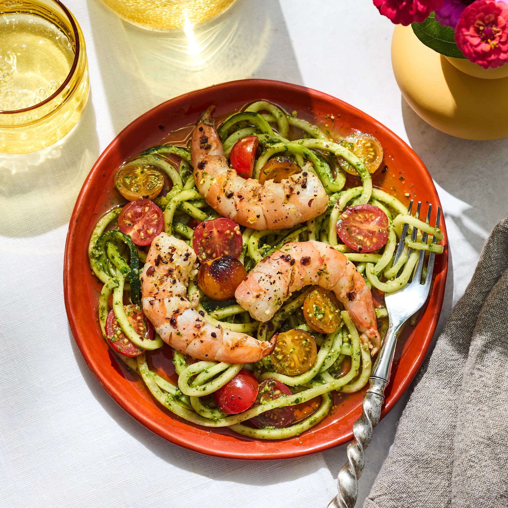 Farmers Market Menu zucchini spirals with grilled prawns and cherry tomatoes are pictured