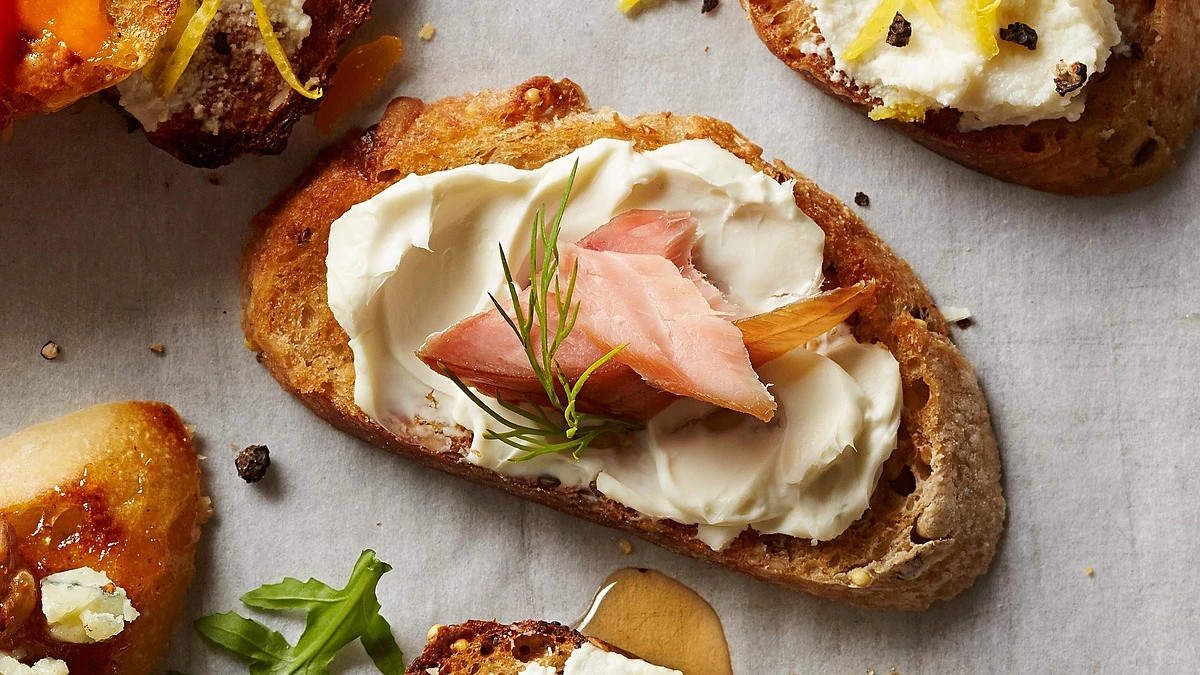A close-up view of smoked salmon cheese toast