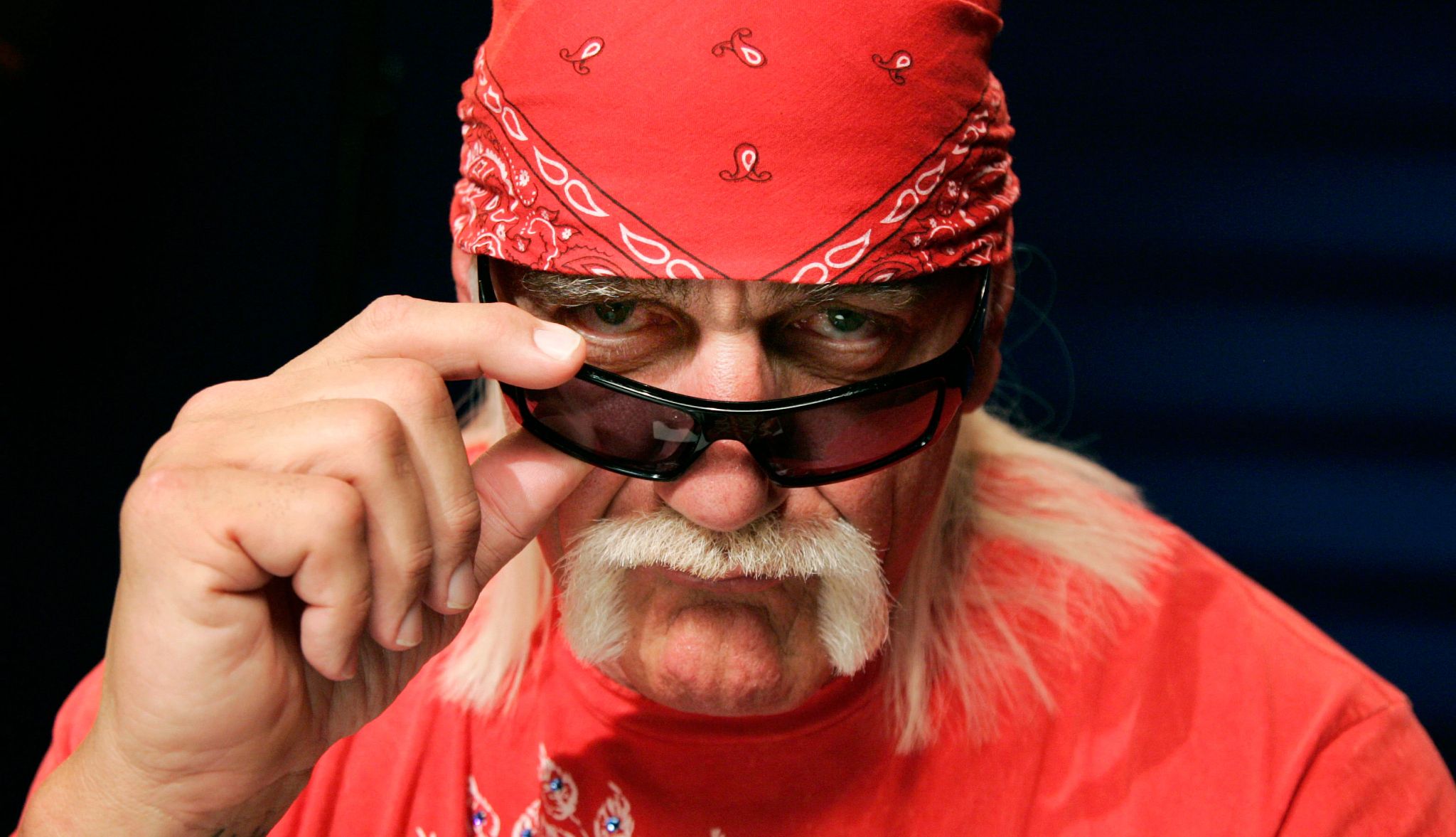 Wrestling Legend Hulk Hogan Dies at 71 Hulk Hogan peeks over sunglasses